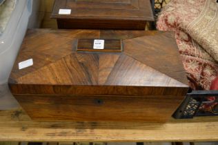 A rosewood sarcophagus shaped tea caddy and an oak box.