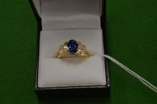 An 18ct yellow gold, diamond and sapphire ring, size N.