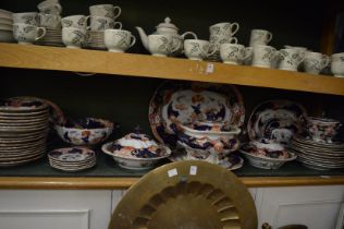 Large quantity of Masons Ironstone Imari pattern dinnerware to include a large tureen cover and