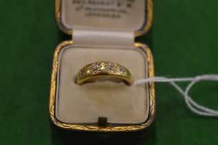 A gold and diamond five stone ring, size L (gold unmarked and untested).