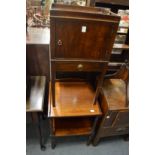 A mahogany pot cupboard and a two-tier table.