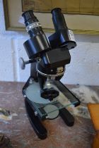 A binocular microscope.