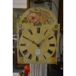 A Continental wall clock with painted arch shaped dial.