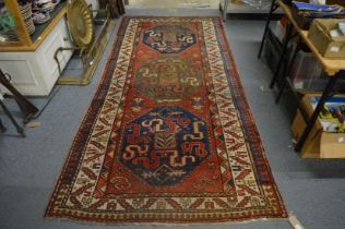 A good early 20th century Persian carpet 270cm x 125cm.