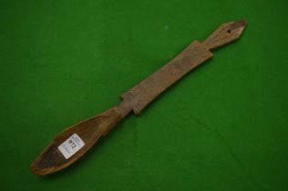 An African carved wood spoon.