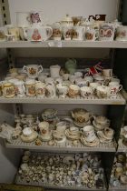 A large quantity of Royal Commemorative and Coronation china to include cups, mugs, teapots,