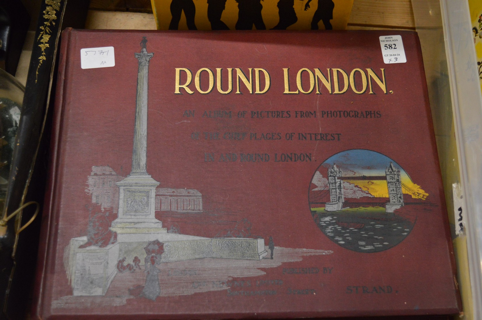 Round London, an album of pictures from the photographs together with another volume Round the coast