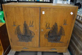 A teak cupboard.