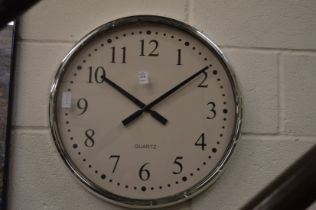 A large circular wall clock.