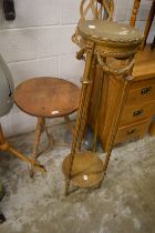 A tripod table and jardiniere stand.