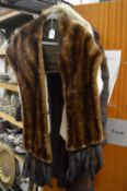 A ladies fur coat and two fur capes/stoles.
