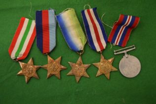 A set of WWII medals (unnamed).