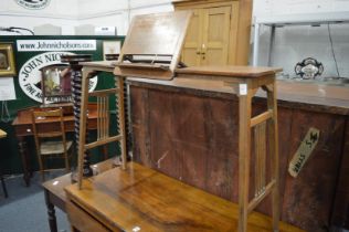 An unusual oak reading table.