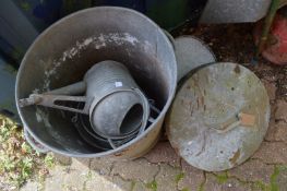 Galvanized garden items to include a dustbin, watering cans, buckets etc.