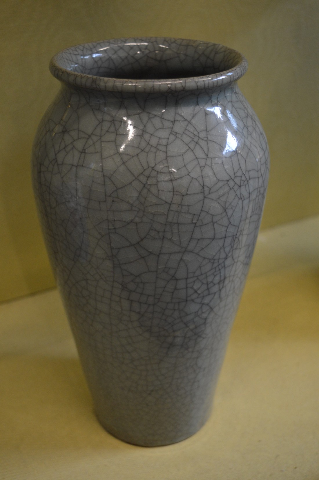 A large Chinese celadon crackle glazed porcelain vase.