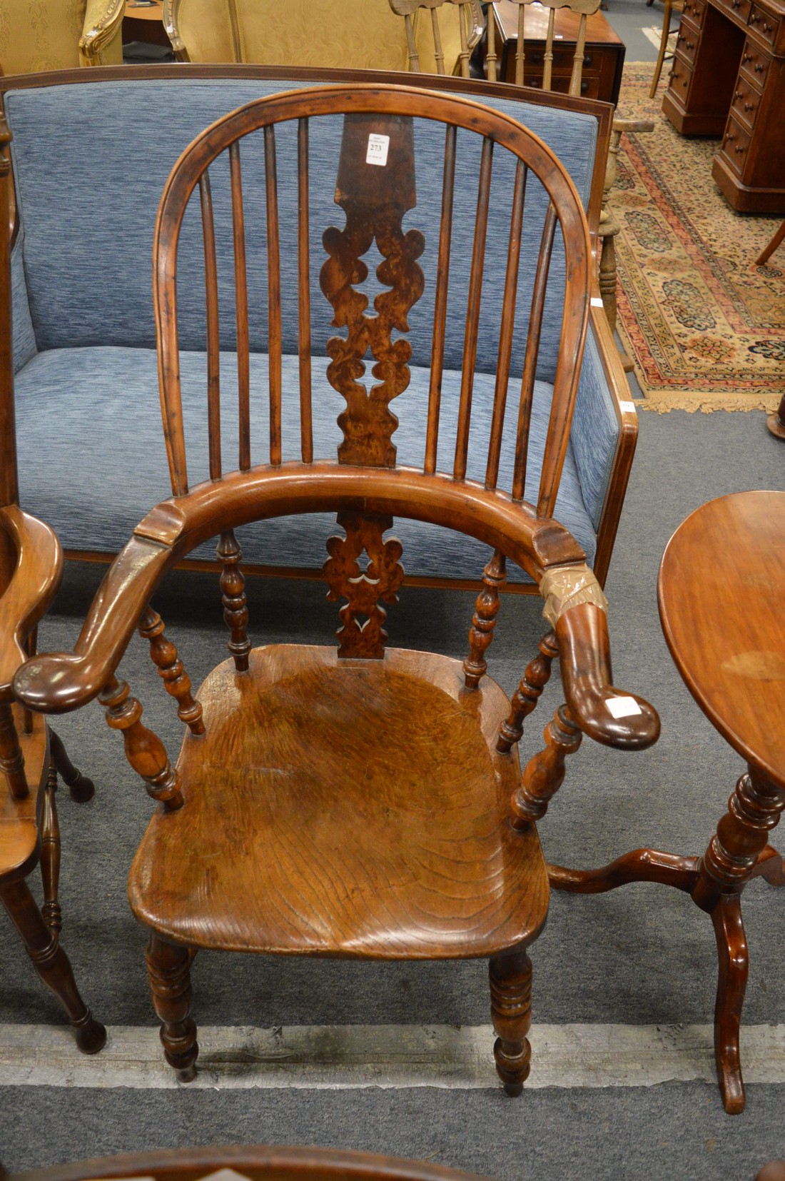 A good 19th century yew and elm broad arm Windsor chair.