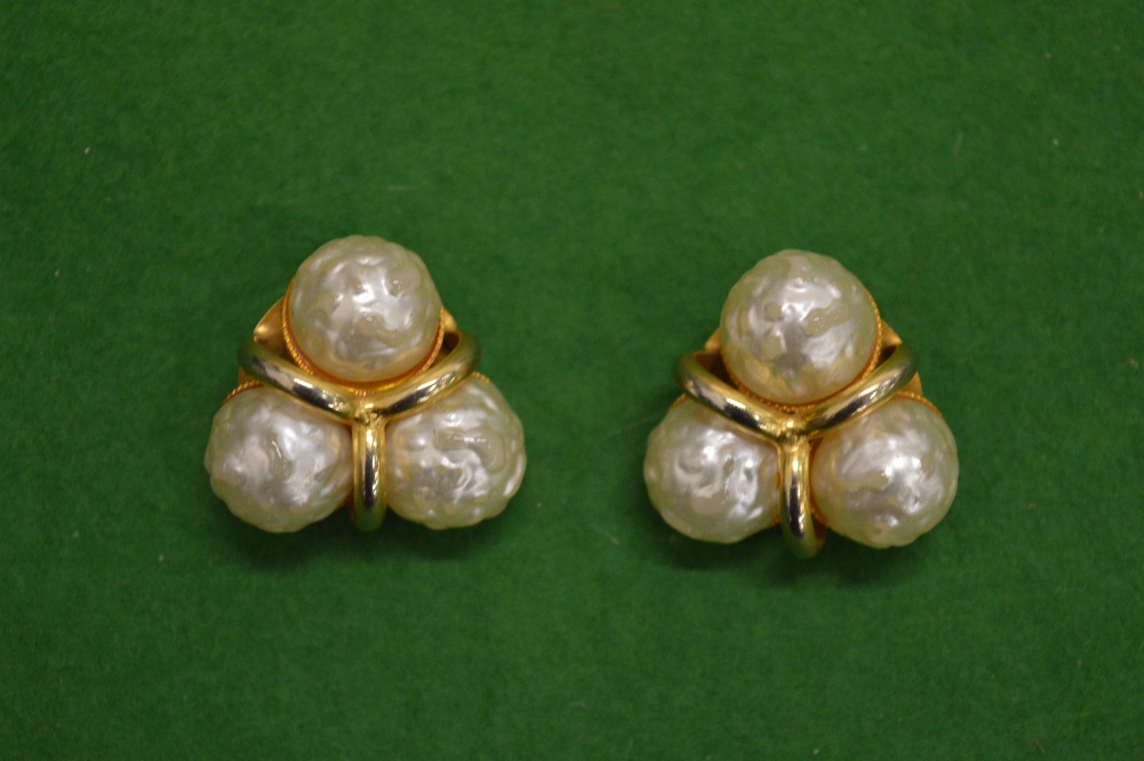 A pair of designer ear clips.