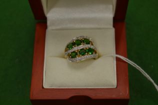 A 14ct yellow gold, diamond and green stone decorative dress ring, size N.