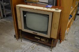 An early Philips television receiver, model number 23TG107U, complete with original manual and cable
