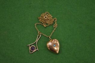 A 9ct gold heart shaped locket inset with a turquoise cabochon stone together with a 9ct gold