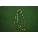 A 9ct gold curb link necklace.