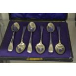 A cased set of six silver plated coffee spoons.