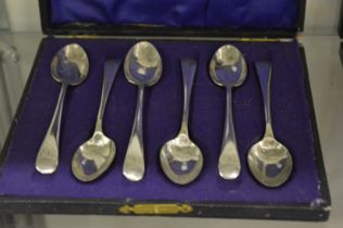 A cased set of six silver plated coffee spoons.