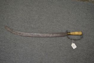 An Eastern cutlass style sword with carved bone grip and engraved blade.