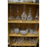 A quantity of cut glassware to include pairs and single decanters.