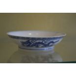 A Chinese small circular blue and white dish.