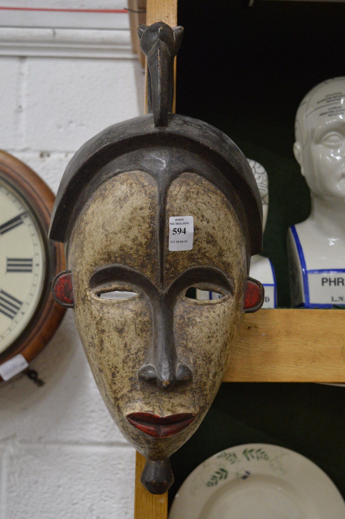 A carved and painted wood mask.