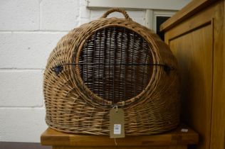 A wicker cat basket.