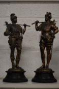 A pair of spelter figures of knights.