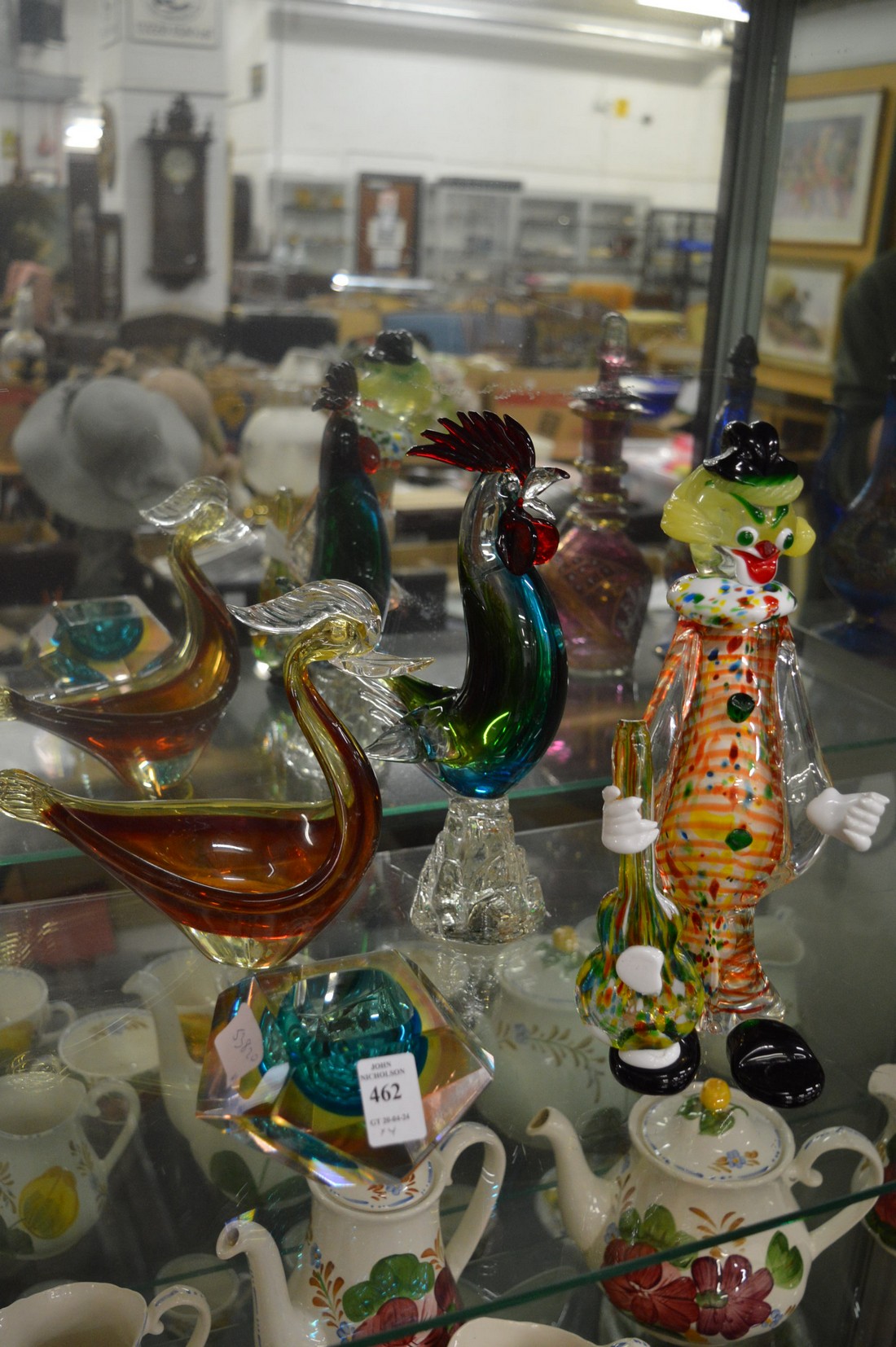 Murano glass clown and other items.