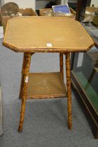 A bamboo occasional table.