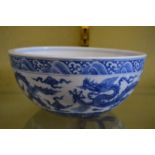 A large Chinese blue and white circular bowl.