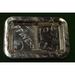 A Christofle small engraved dish with original cloth bag.