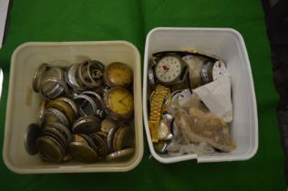 A quantity of pocket watch parts etc.