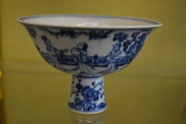 A Chinese blue and white stem cup.