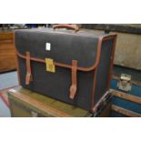 Lloyd Jennings of London, a leather and canvas eight bottle travelling trunk.