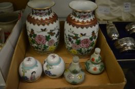 A pair of modern Chinese porcelain vases, miniature pair of ginger jars and a miniature pair of