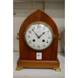 A Maple & Co mahogany cased lancet shaped mantle clock.