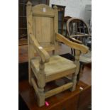 A child's hardwood panel back armchair.