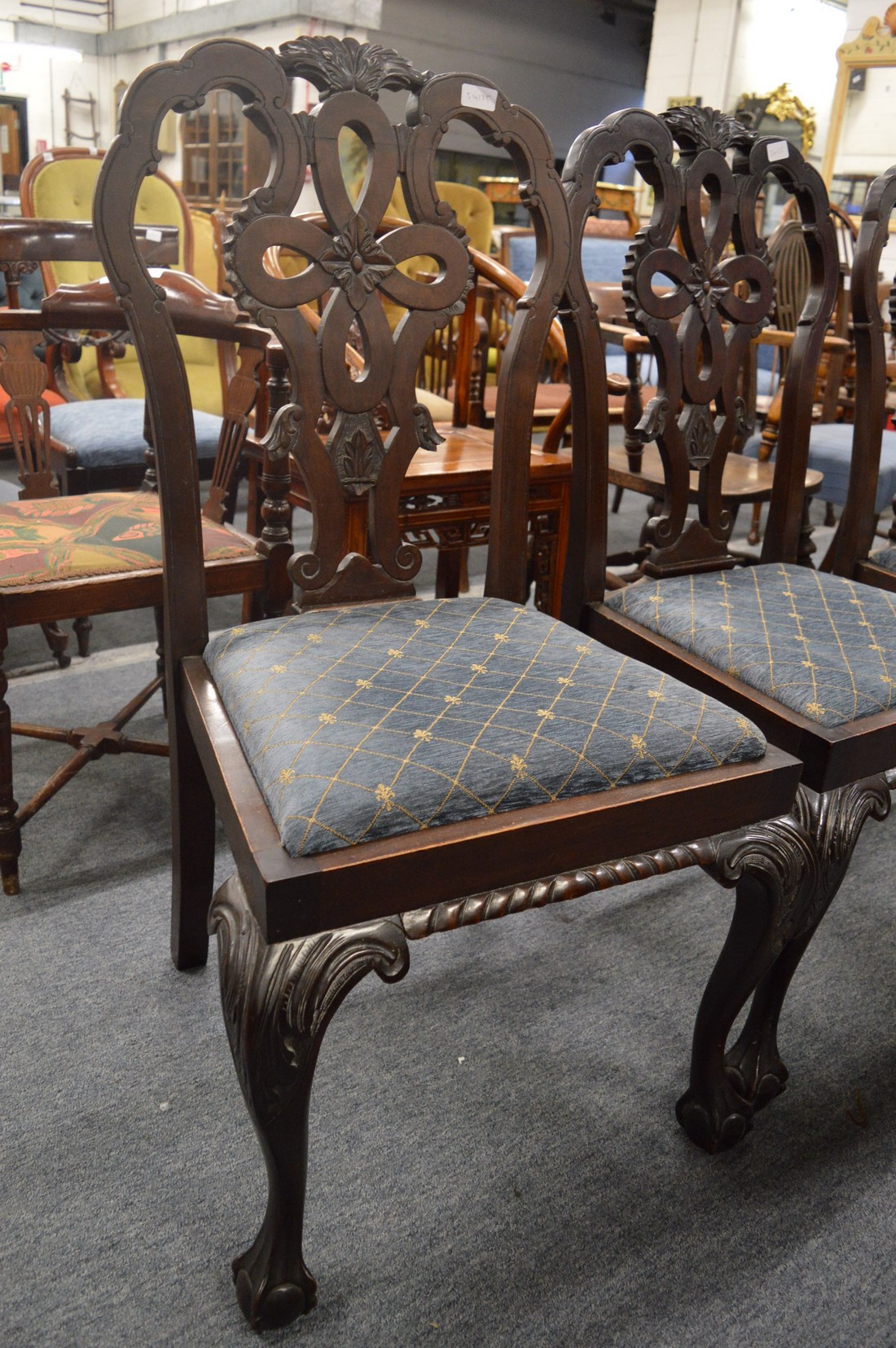 A set of four mahogany dining chairs with carved backs and legs. - Image 2 of 2