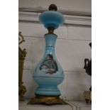 A good large pair of pale blue opaque glass and brass lamp bases decorated with Lord Nelson and Lady