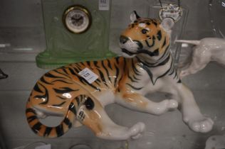 A large Russian porcelain model of a recumbent tiger.