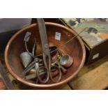 Copper bowl with various other items.