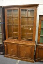 An oak library cupboard bookcase.