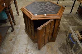 An unusual gothic style hexagonal shaped coffee table/storage box.