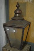 An old copper lantern top.